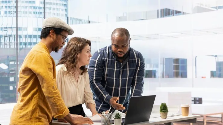 A businesswoman planning in an office — an article about ways Nigerian businesses can use AI