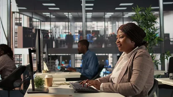 A manager working in an office — an article about AI business intelligence for Nigerian SMEs
