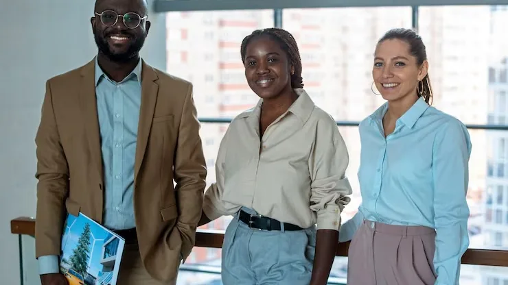 Business colleagues working in an office — an article about AI customer service for Nigerian businesses