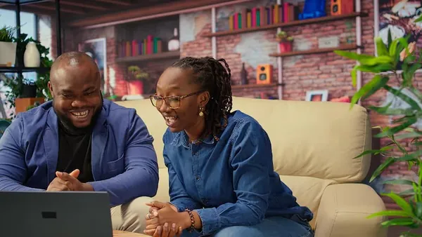 African business colleagues in a meeting in an office — an article about AI customer support on WhatsApp