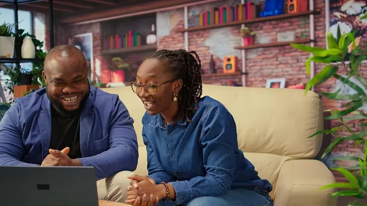 African business colleagues in a meeting in an office — an article about AI customer support on WhatsApp