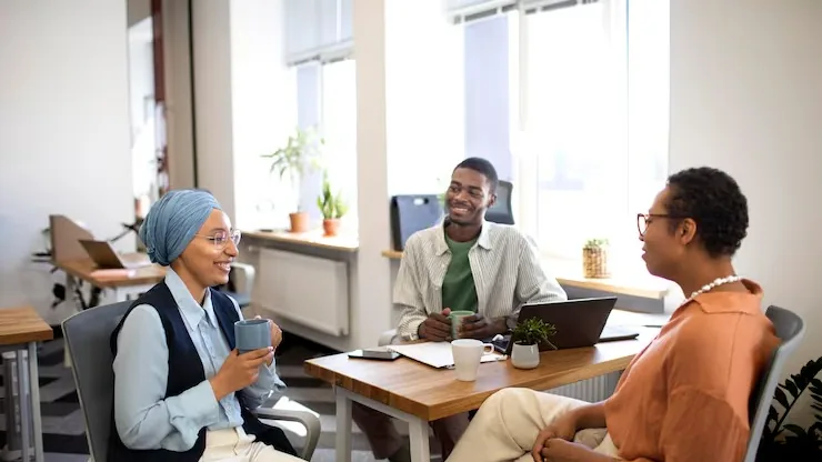 Business colleagues working in an office — an article about AI for Nigerian importers