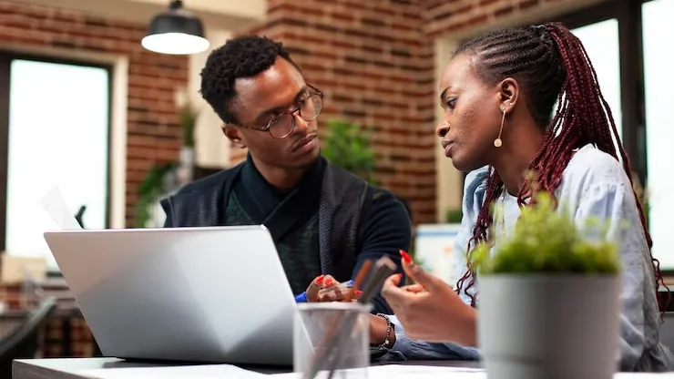 A businesswoman in a meeting in an office — an article about AI for Nigerian travel businesses