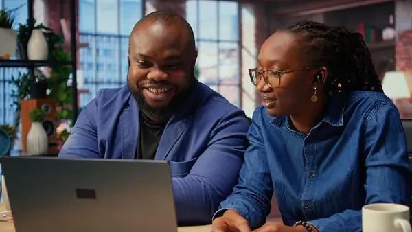 An African businesswoman at home — an article about AI implementation checklist