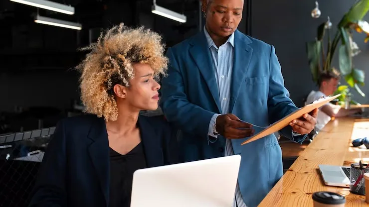 Business colleagues working in an office — an article about AI in Nigerian healthcare