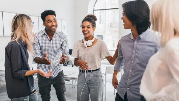 African business colleagues in a meeting in an office — an article about AI security for Nigerian businesses