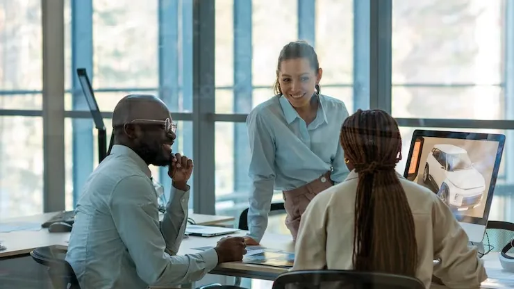 Business colleagues working in an office — an article about accounting automation Nigeria