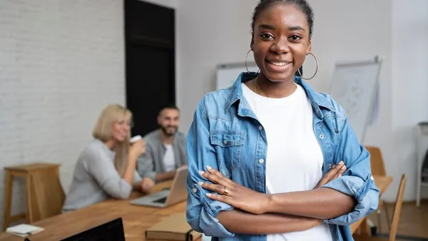 Business colleagues working in an office — an article about automating appointment booking in Nigeria