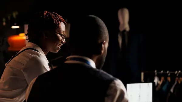 Business colleagues working in an office — an article about payment automation Nigeria