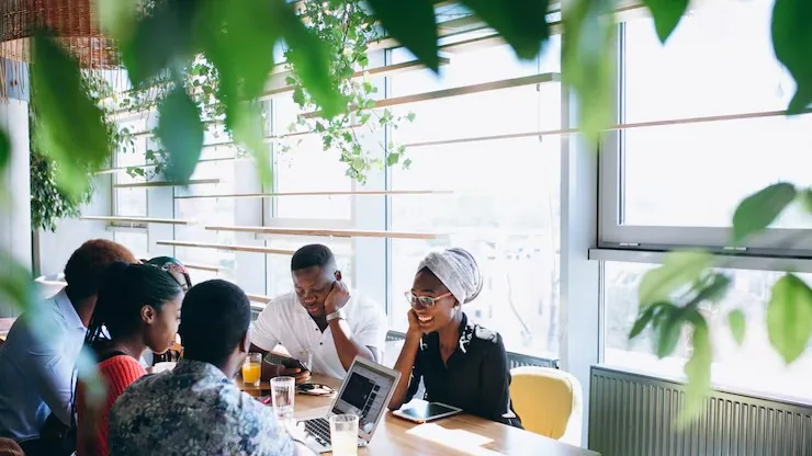 African business colleagues working in an office — an article about AI tools for HR teams Nigeria