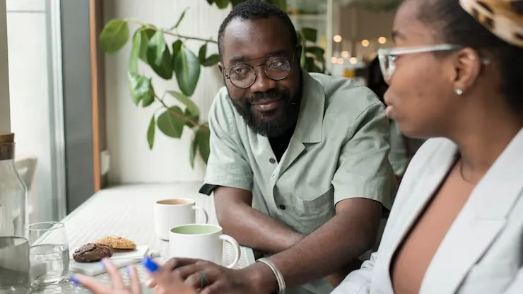 Business colleagues working in an office — an article about AI tools for restaurants Nigeria