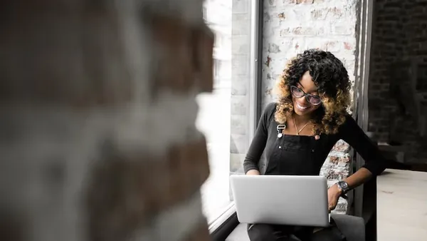 African business colleagues working in an office — an article about business automation for Nigerian SMEs