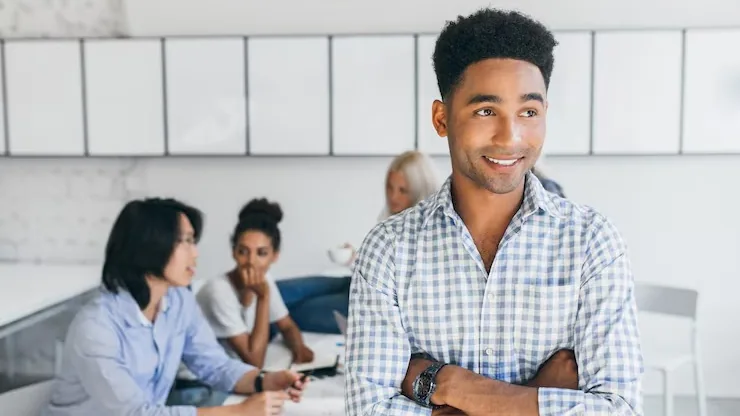 African business colleagues in a meeting in an office — an article about business automation ideas for Nigerian law firms