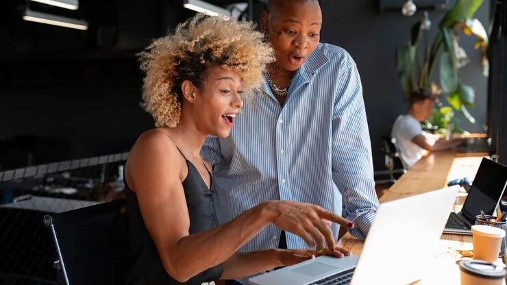 Business colleagues working in an office — how to start a digital business in Nigeria