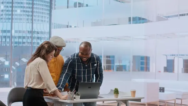 Business colleagues working in an office — an article about digital business ideas for Nigerian entrepreneurs