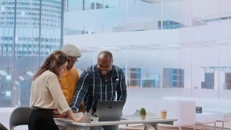 Business colleagues working in an office — an article about digital business ideas for Nigerian entrepreneurs