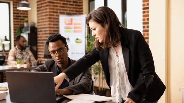 A businesswoman in a meeting in an office — an article about digital strategy for Nigerian startups