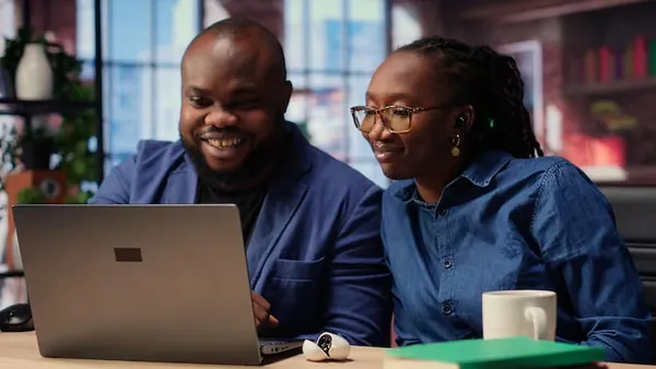 African couple working in an office — an article about digital transformation checklist