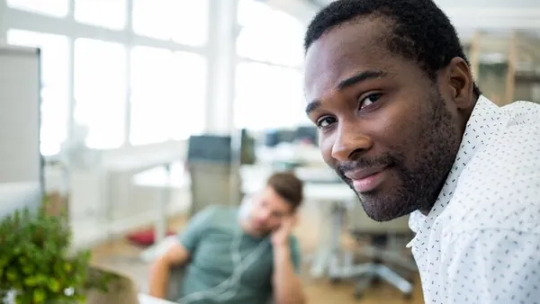 A businessman at work in an office — an article about digital transformation for Nigerian SMEs