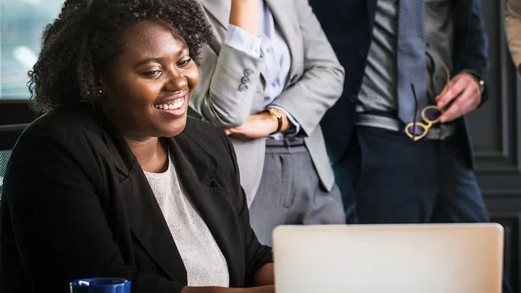 Business colleagues in a meeting in an office — an article about Flutter app development in Nigeria
