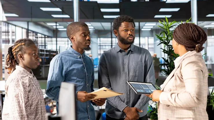 African business colleagues planning in an office — how digital tools help Nigerian SMEs scale