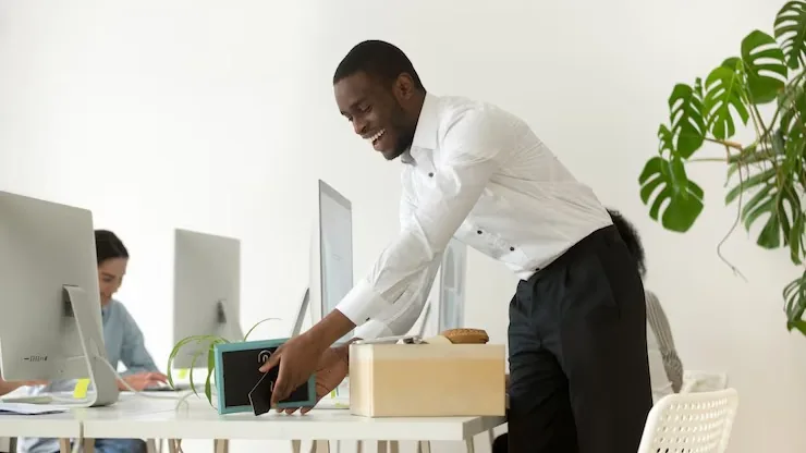 African business colleagues working in an office — an article about cost to build an AI app in Nigeria