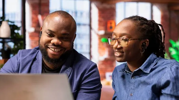 An African businesswoman at home — an article about cost to build an online business