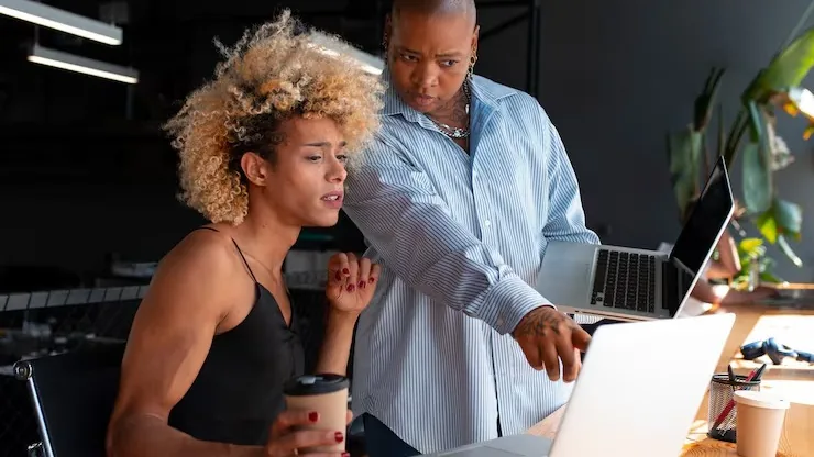 Business colleagues working in an office — an article about technology in Nigerian retail