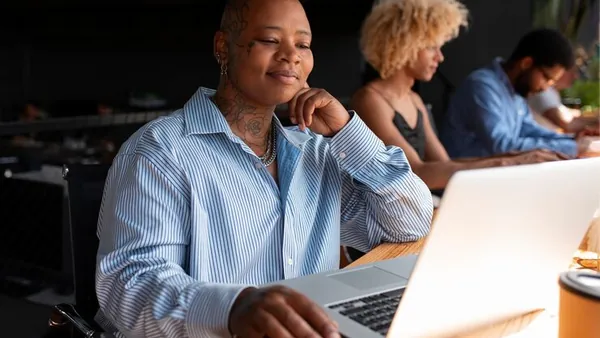 Business colleagues working in an office — how to accept bank transfer payments online