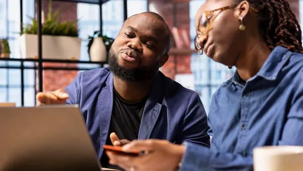 Business colleagues working in an office — how to accept card payments online in Nigeria