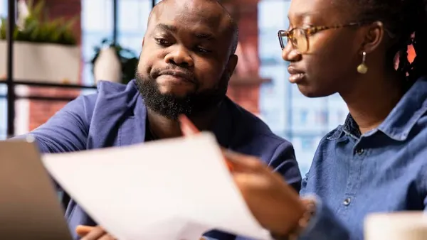 African couple at home — how to accept USSD payments online