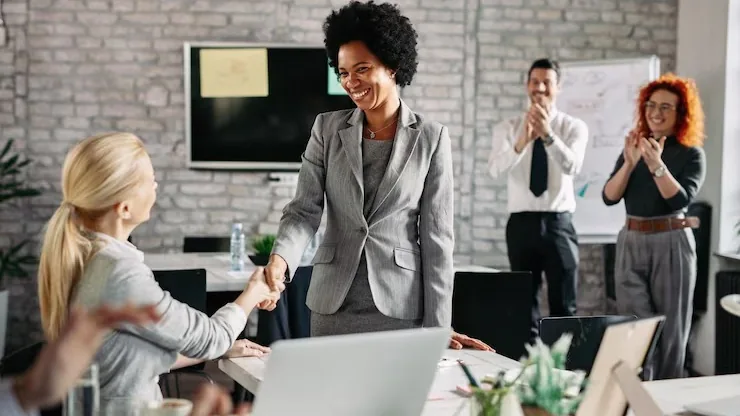 African business colleagues at work in an office — how to add login with Google to a mobile app