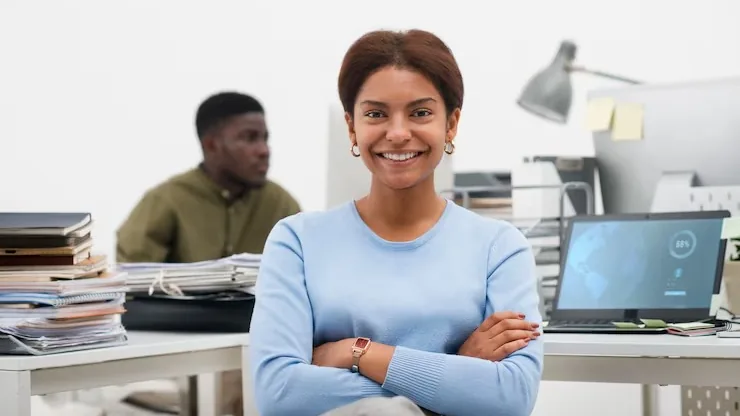 Business colleagues working in an office — how to add WhatsApp integration to a mobile app