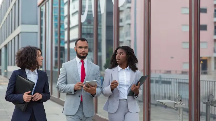 Business colleagues on a call in an office — an article about automate WhatsApp booking