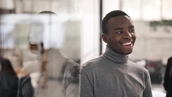 A businessman at work in an office — how to budget for software development in Nigeria