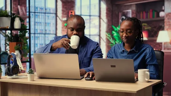 An African businesswoman at home — an article about build a customer app in Nigeria