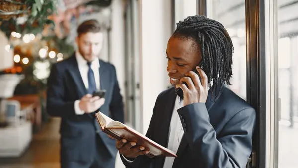 African business colleagues working in an office — how to build a delivery management platform
