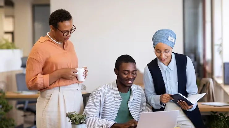 Business colleagues working in an office — an article about mobile app with barcode scanning