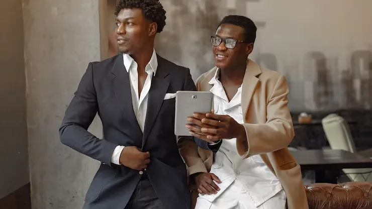 African business colleagues working in a cafe — an article about private AI assistant for business