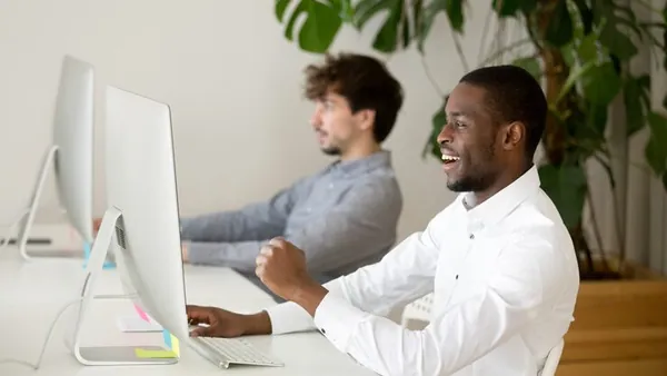 African business colleagues at work in an office — how to build an online service marketplace