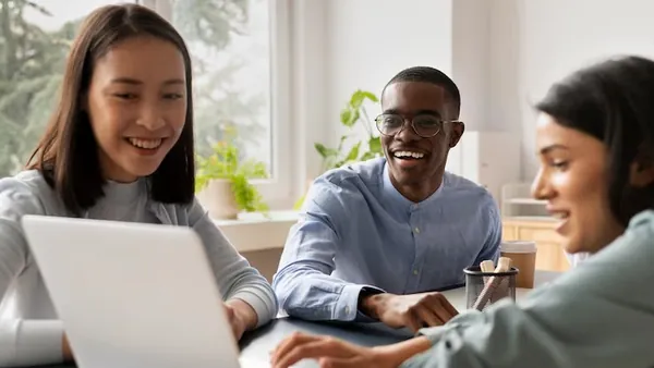 Business colleagues working in an office — how to get more customers for an online store in Nigeria