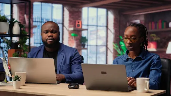 African couple at home — how to move a Nigerian business from paper to digital