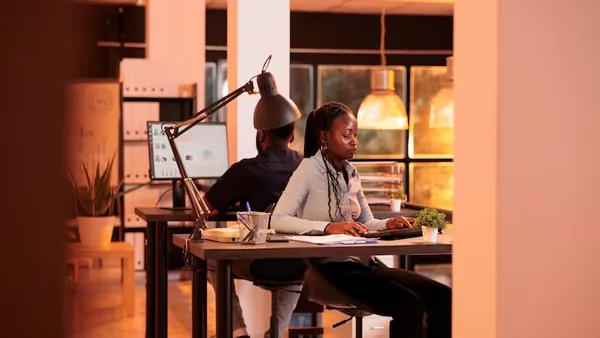 A manager reviewing at a computer in an office — how to rank a website on Google in Nigeria