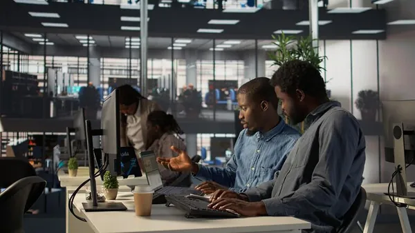African business colleagues planning in an office — how to test an app idea