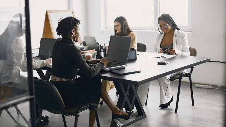 Business colleagues in a meeting in an office — an article about legal document automation in Nigeria
