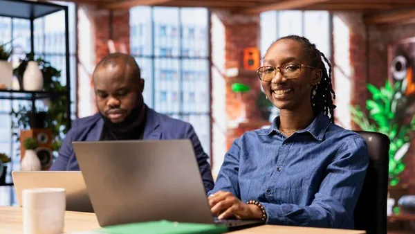 An African businesswoman at home — an article about mobile app testing checklist