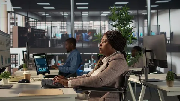 African business colleagues planning in an office — an article about MVP development cost in Nigeria