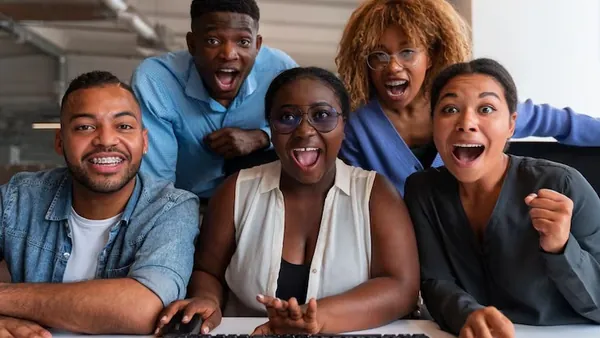 Business colleagues working in an office — an article about payment platform development in Nigeria