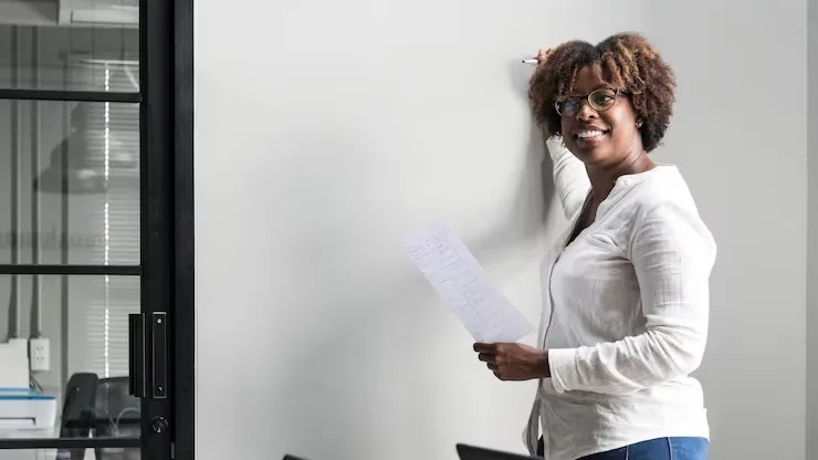 A businesswoman in a meeting in an office — questions to ask an app development company