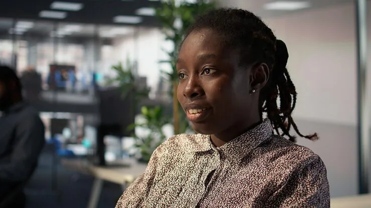 An African businesswoman working in an office — an article about restaurant website design in Nigeria